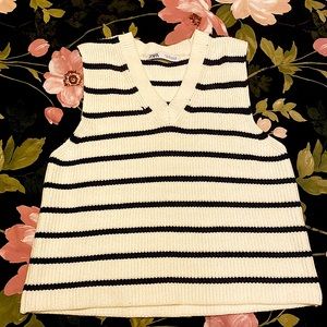 A sleeveless sweather from zara